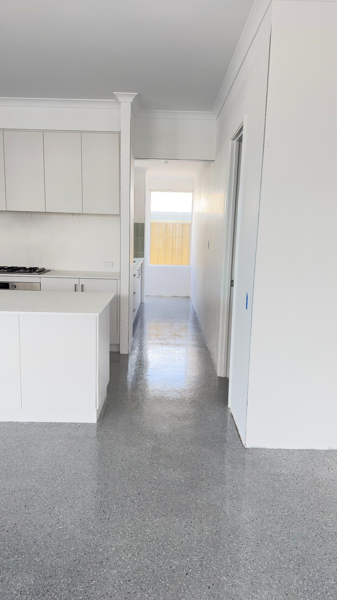 Finished epoxy floor through kitchen and hallway
